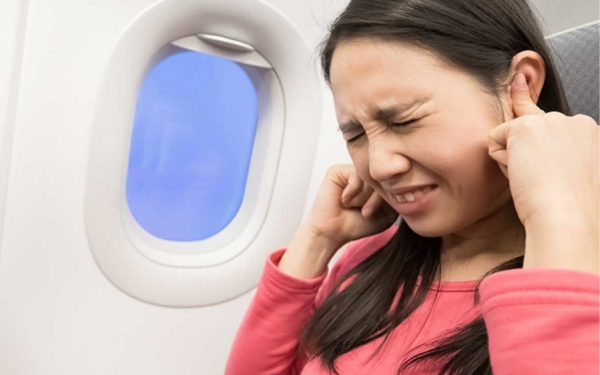 What causes tinnitus when flying? Effective remedies