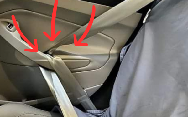 Why do people put seat belts on car doors?