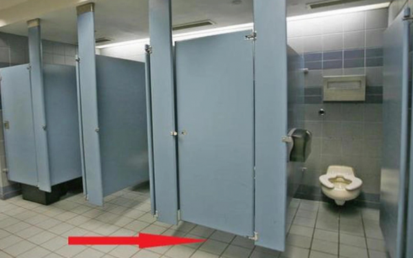 Why are public toilet doors always left open?